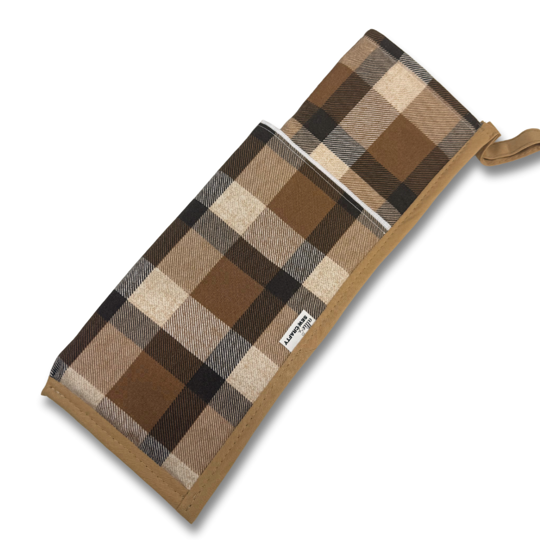 Plaid-patterned pouch with a strap on a white background