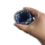 Blue Wildflowers Meadow quilted Flexi Frame Pouch, empty, snap frame open showing the navy interior lining