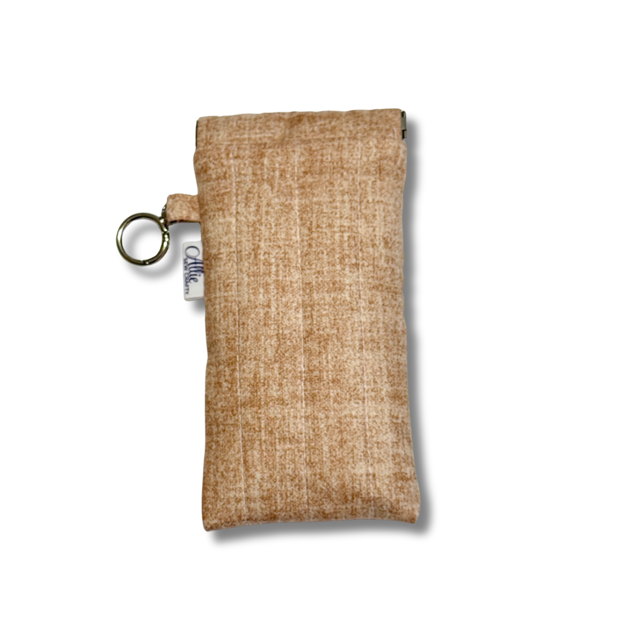 A rectangular tan woven fabric pouch with a small metal key ring and a small fabric tag, shown on a plain white background.