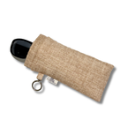 A beige textured fabric pouch holding sunglasses with a small white fabric tag reading 'Allie Sew Crafty' and a metal key ring, on a white background.