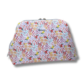 Floral patterned pouch with 'The Sew Crafty' label on a white background