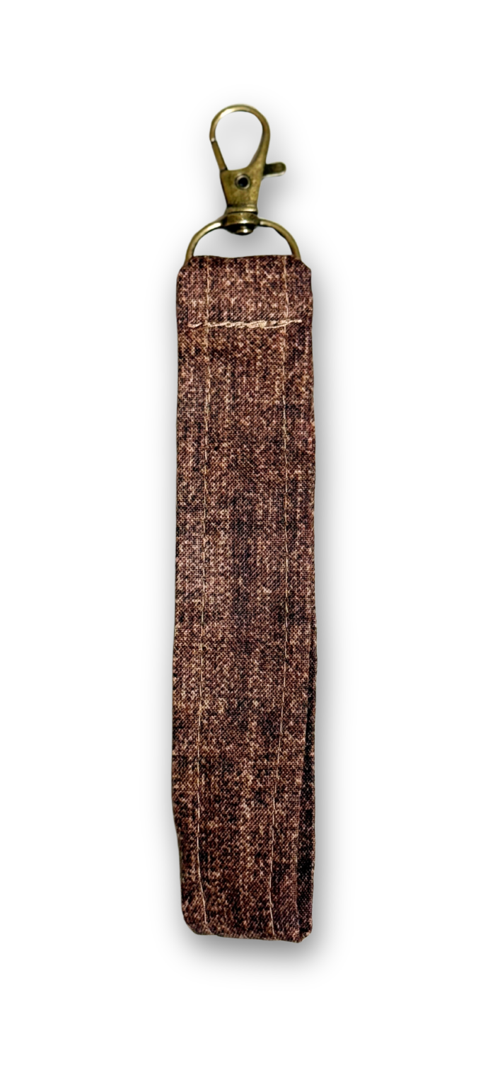 brown wristlet lanyard in white background